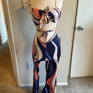 Two piece set. Still with tags. Size small